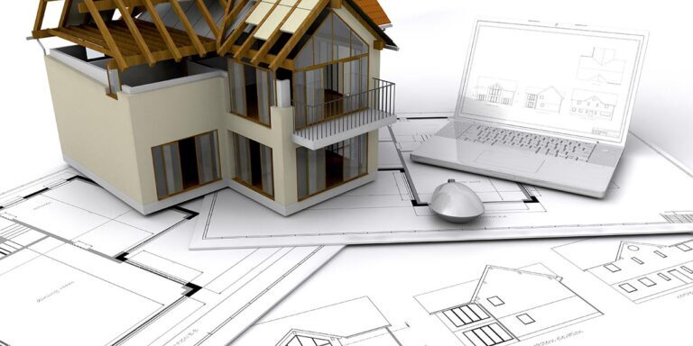 blueprint and laptop